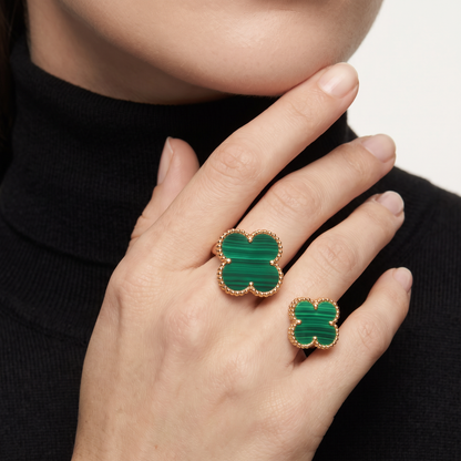 Green Malachite Clover Between The Finger Ring
