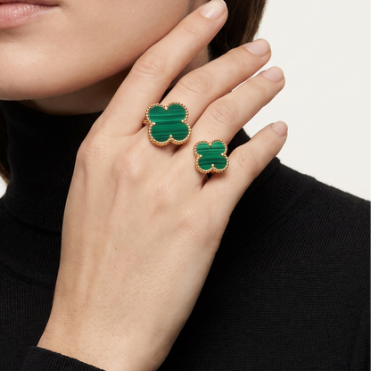 Green Malachite Clover Between The Finger Ring