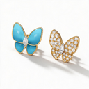 Two Butterfly Turquoise And Paved Charm Earrings